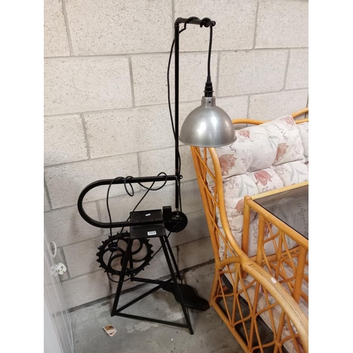 2924 - An industrial floor lamp made from a treadle fret saw