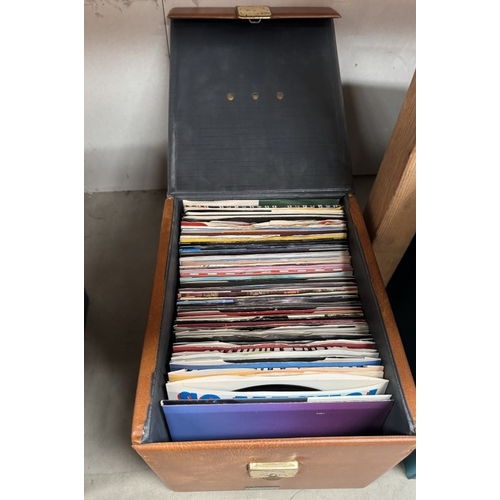 11 - A case of 45rpm records, mostly 80s