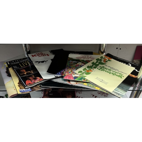 25 - A quantity of Souvenia programmes & LPs including Michael Jackson, Grease, Elton John etc