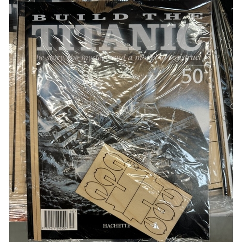 54 - A Complete unopened set of Build The Titanic No 1 - 100, All sealed & 3 folders