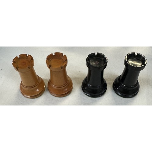 2718 - A weighted wood chess set, A smaller chess board & A vintage boxed wood skittle set