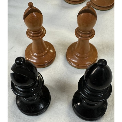 2718 - A weighted wood chess set, A smaller chess board & A vintage boxed wood skittle set