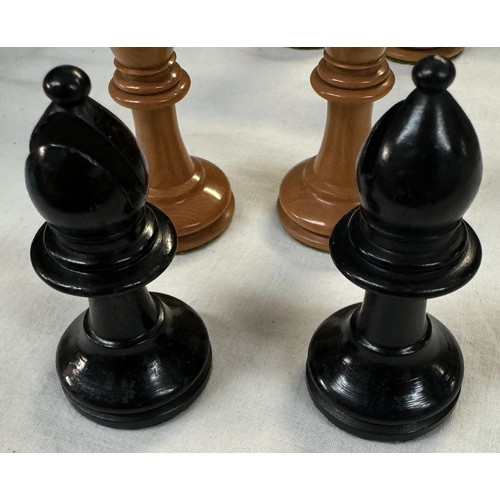 2718 - A weighted wood chess set, A smaller chess board & A vintage boxed wood skittle set