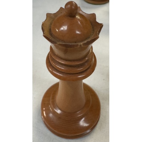 2718 - A weighted wood chess set, A smaller chess board & A vintage boxed wood skittle set