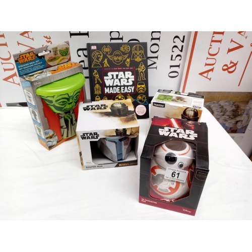 61 - A quantity of new Star Wars items including mugs, meal set & book etc.