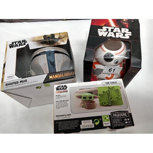 61 - A quantity of new Star Wars items including mugs, meal set & book etc.