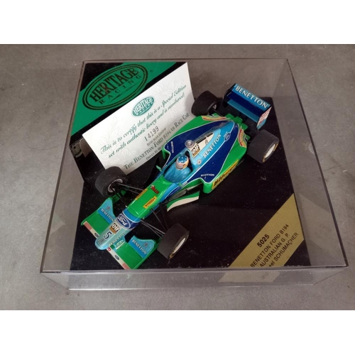 70 - 5 boxed Heritage racing cars, Schumacher x2, Ayrton Senna, David Coulthard & Nigel Mansell