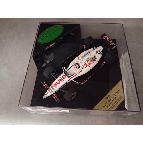 70 - 5 boxed Heritage racing cars, Schumacher x2, Ayrton Senna, David Coulthard & Nigel Mansell