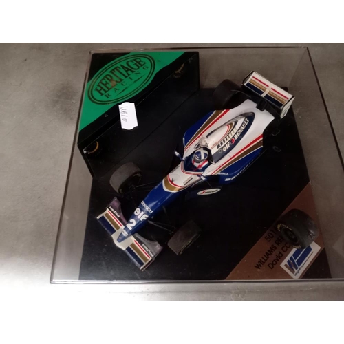 70 - 5 boxed Heritage racing cars, Schumacher x2, Ayrton Senna, David Coulthard & Nigel Mansell