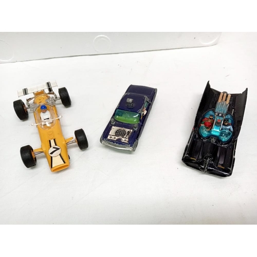 71 - A Corgi Bat mobile & man from uncle Oldsmobile super 88 Scalextric cars & controller