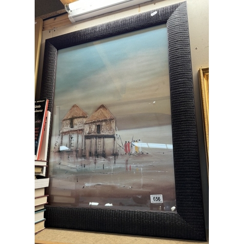 656 - A large framed tribal print of houses on stilts