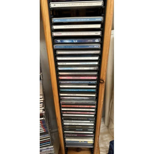 670 - A quantity of CD's on 2 storage shelves