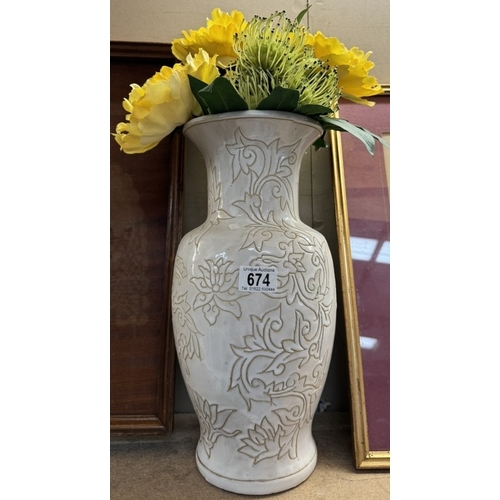 674 - A large pottery vase. Height 39cm