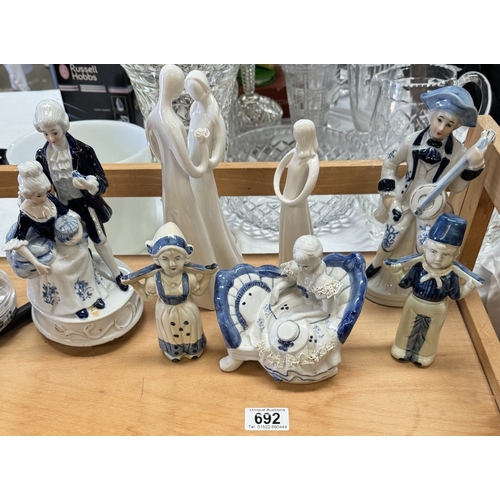 692 - A selection of figural ornaments including Ryn Bende bottles