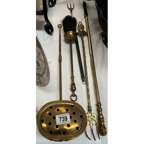 739 - A brass chestnut roaster, toasting forks & pokers etc