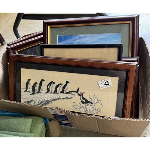 745 - A box of framed pictures