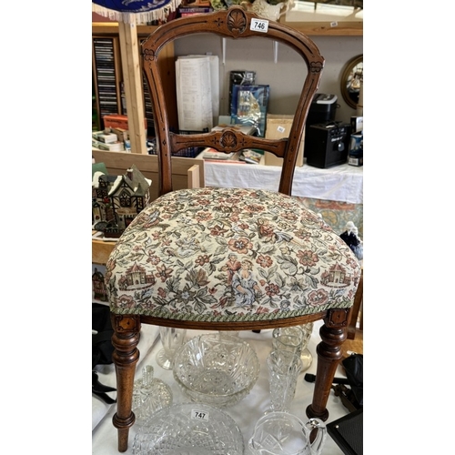 746 - An Edwardian carved mahogany chair with tapestry top