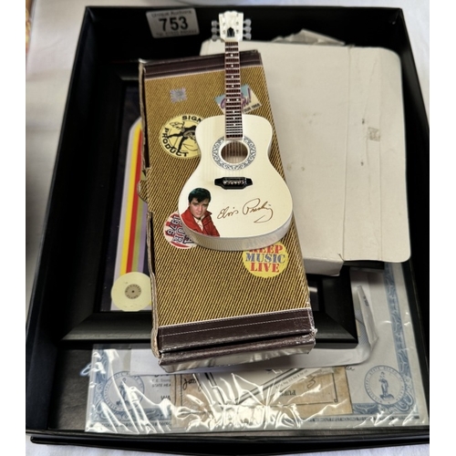 753 - A quantity of Elvis Presley ephemera including atlas edition miniature acoustic guitar etc