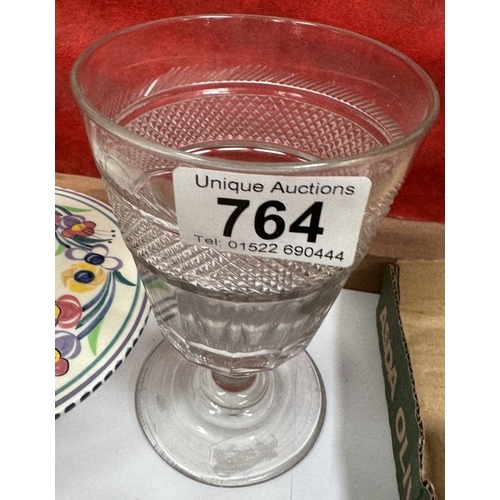 764 - An antique cut wine glass