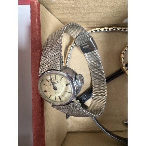 770 - A box of ladies watches including Sekonda