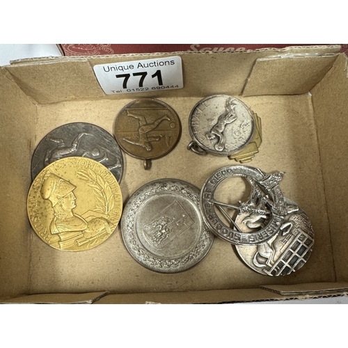 771 - A small box of medals including British Universities