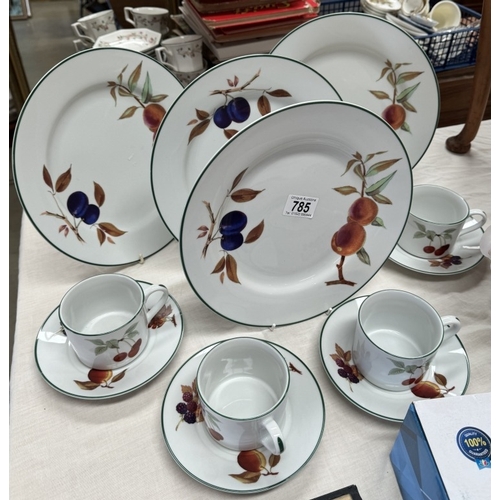 785 - A quantity of Royal Worcester Evesham Vale including 4 cups/saucers & 4 dinner plates