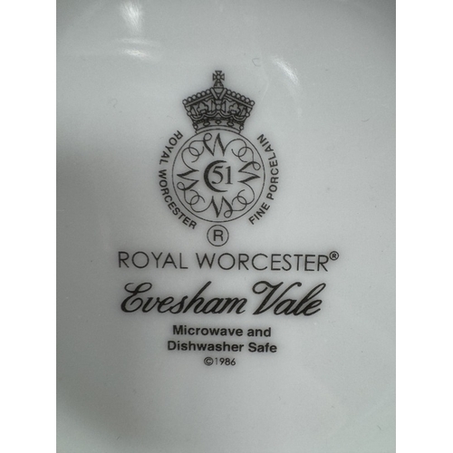 785 - A quantity of Royal Worcester Evesham Vale including 4 cups/saucers & 4 dinner plates