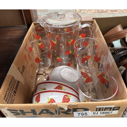 795 - A plastic strawberry pattern, drinks glasses, jug & 4 cereal bowls