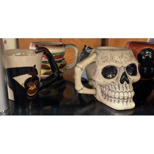 818 - A quantity of character mugs