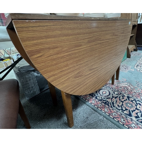 838 - A drop leaf table