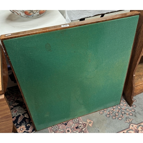 839 - A vintage folding card table