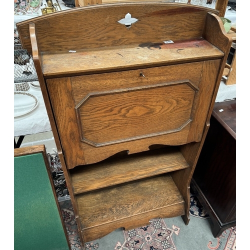 840 - An arts & crafts oak bureau bookcase