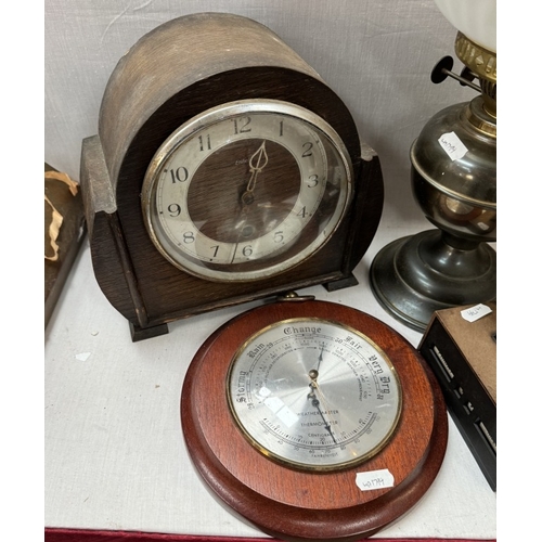 856 - A perpetual calendar, oil lamp, round barometer & mantel clock