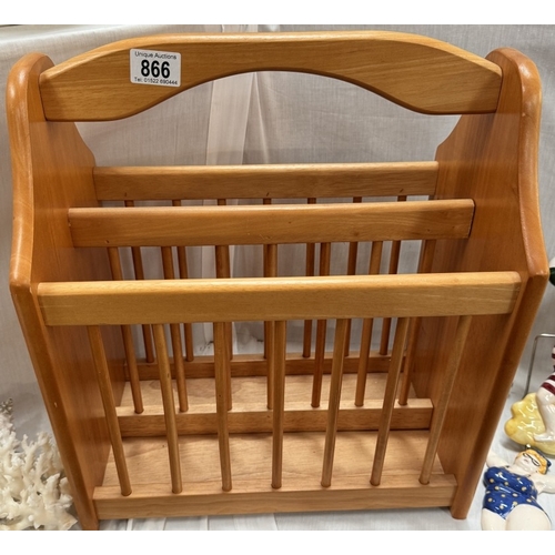 866 - A large wooden magazine rack