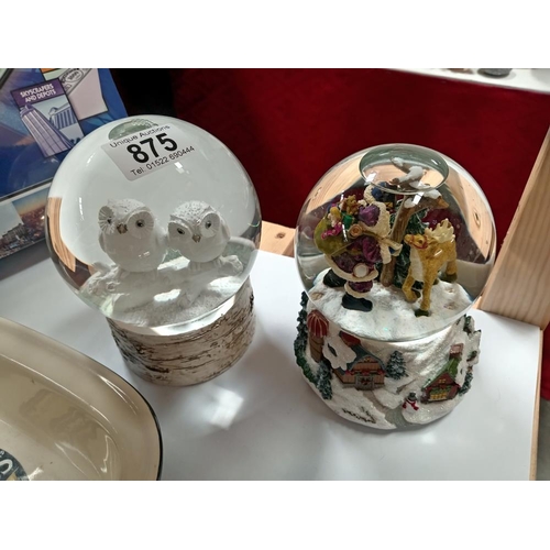 875 - 2 snow globes one with owls & one with Father Christmas (musical)