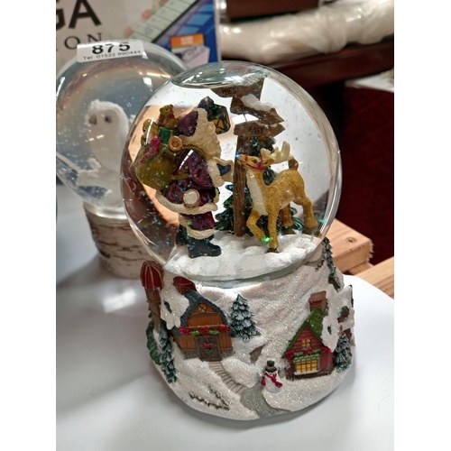 875 - 2 snow globes one with owls & one with Father Christmas (musical)