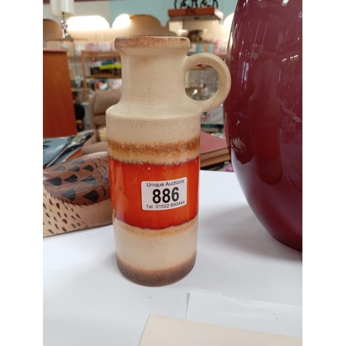 886 - A West German vase with handle, 20.5cm