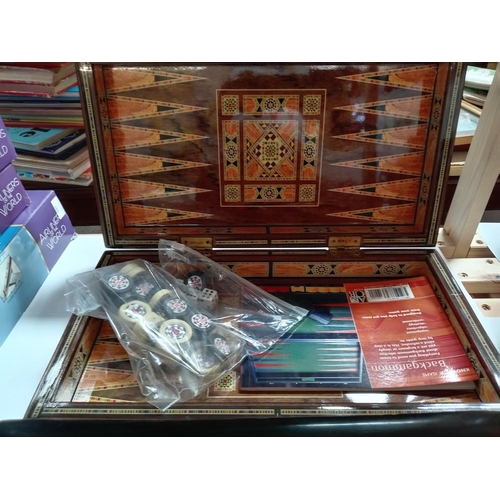 890 - A beautifully ornate games box for chess & backgammon including contents