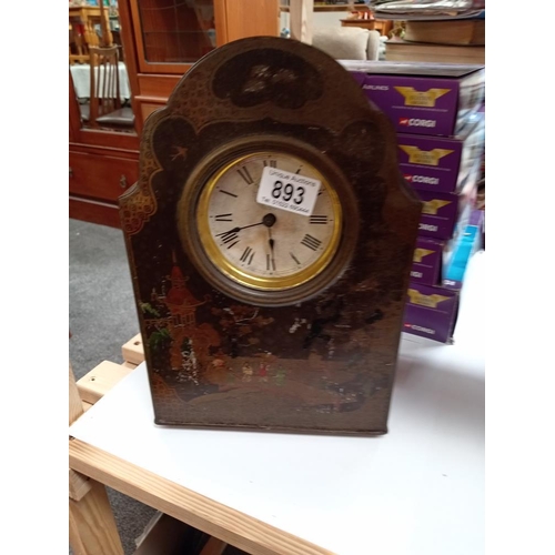 893 - A vintage oriental lacquered tin mantle clock