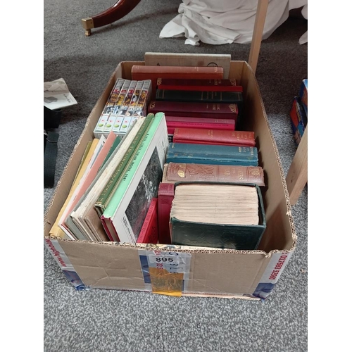 895 - A box of books including Dickens, George Elliot etc & A set of The Beatles CD's