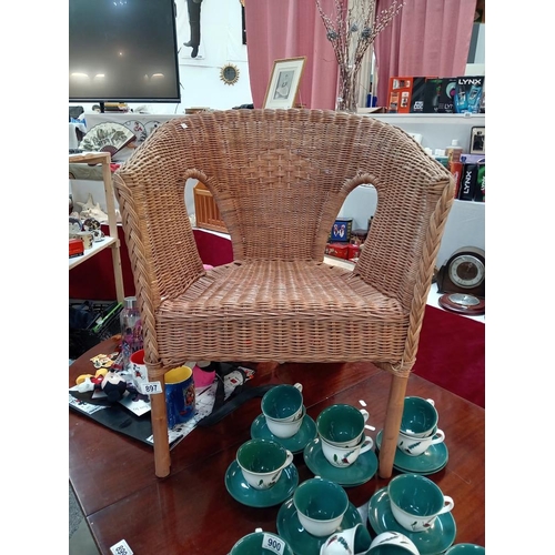 897 - A wicker Lloyd Loom style chair