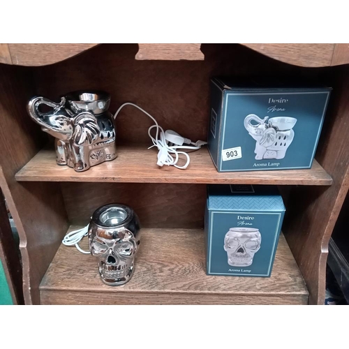 903 - 2 boxed Desire aroma lamps, an elephant & skull