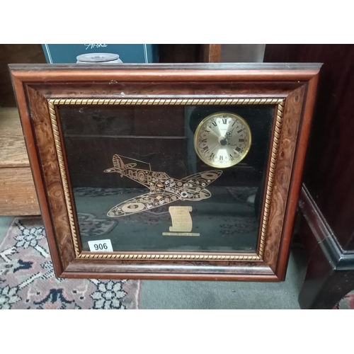 906 - A framed & glazed Supermarine Spitfire MK1 plane & clock (The Battle of Britain 1940)