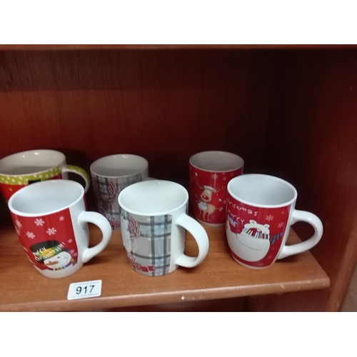 917 - A quantity of Christmas mugs