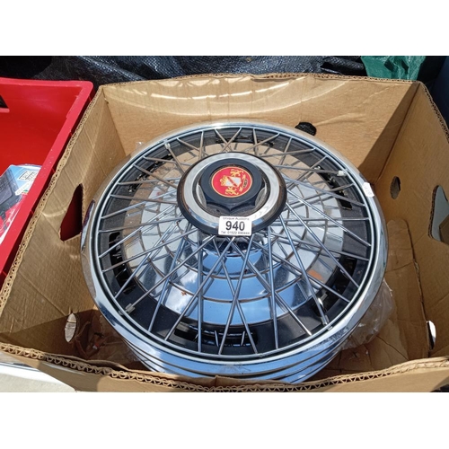 940 - A quantity of 15'' wire wheel hub caps