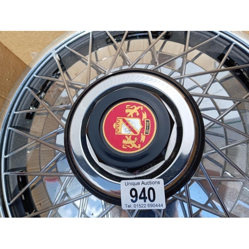 940 - A quantity of 15'' wire wheel hub caps