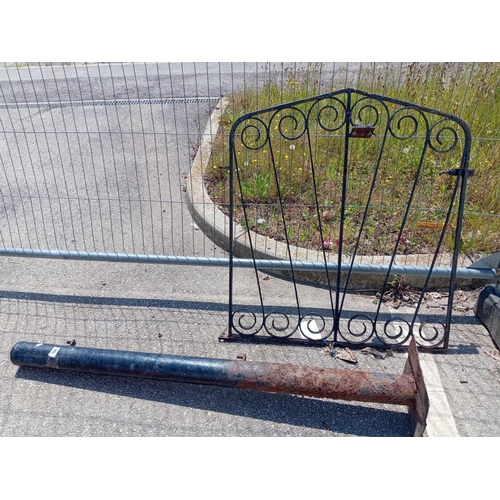 956 - A wrought iron gate with post