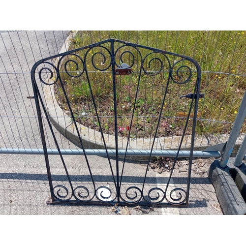 956 - A wrought iron gate with post