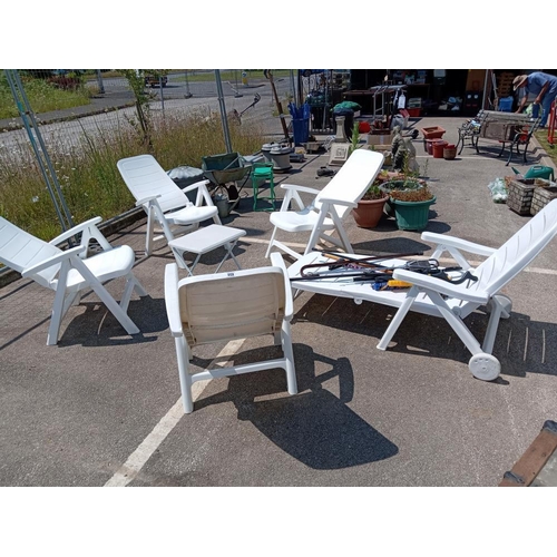 959 - 4 White plastic garden reclining chairs & A lounger