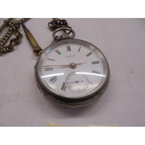 1077 - A silver pocket watch (Hannford, Poole) on a brass Albert.